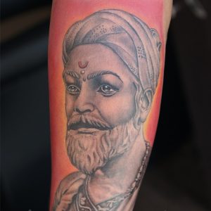 Red Indian Tattoo Done by Mahesh Ogania at laksh Tattoo Goa India.
